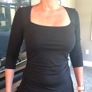 Calvin Klein black knit top neckline interest